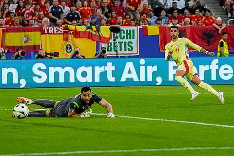 Spain's Ferran Torres scores his side's opening goal